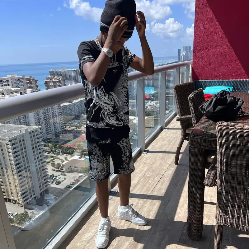 Lil 50 outfit in Givenchy, Nike, and Louis Vuitton, 2022