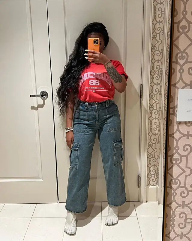 JT outfit in Balenciaga, Urban Outfitters, and Chanel, 2022