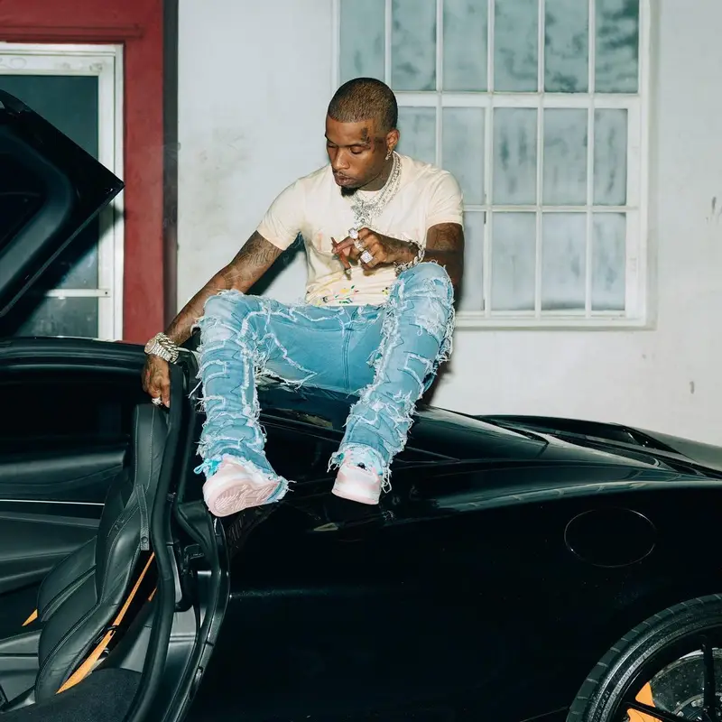 Tory Lanez outfit in Lanvin, Audemars Piguet, and Gallery Dept., 2022