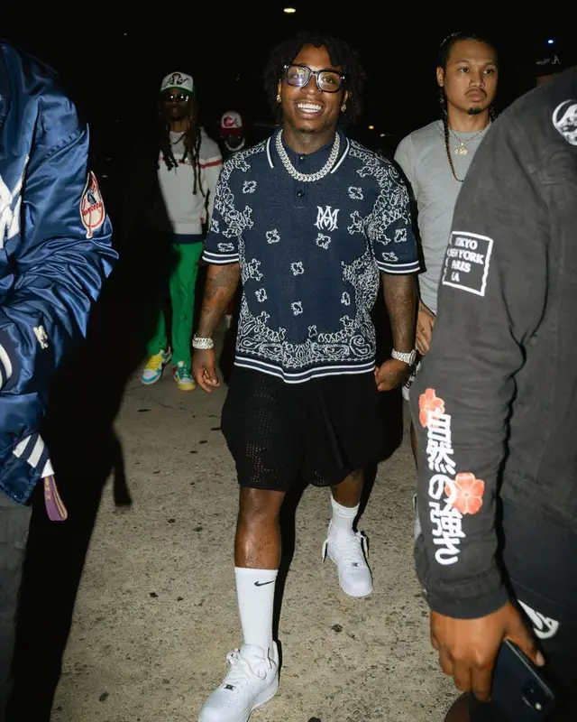 Jacquees outfit in Amiri, Louis Vuitton, and Nike, 2022