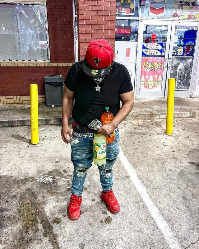 Guap Tarantino outfit in Dolce & Gabbana, Louis Vuitton, and New Era, 2022