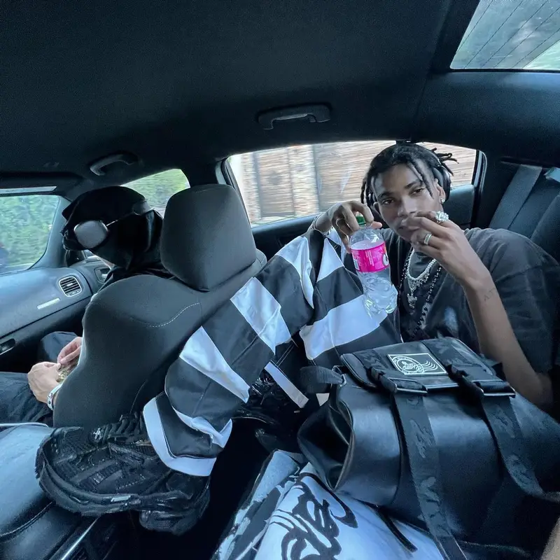 Onlybino outfit in Balenciaga, Vivienne Westwood, and Apple, 2022
