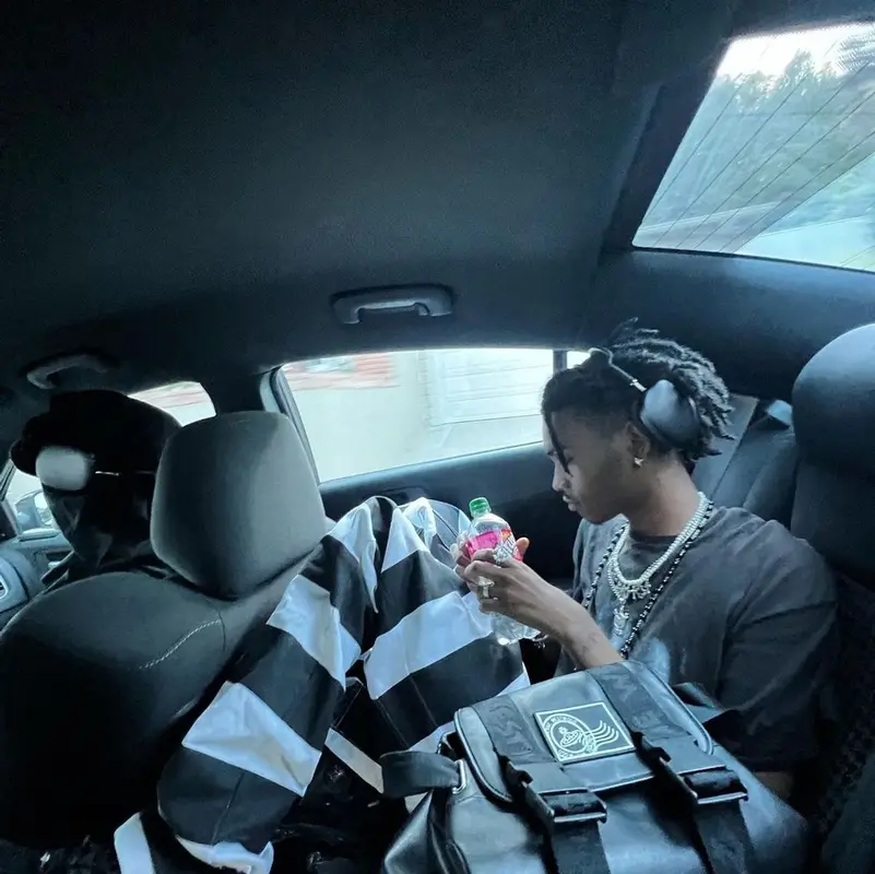 Onlybino outfit in Balenciaga, Vivienne Westwood, and Apple, 2022