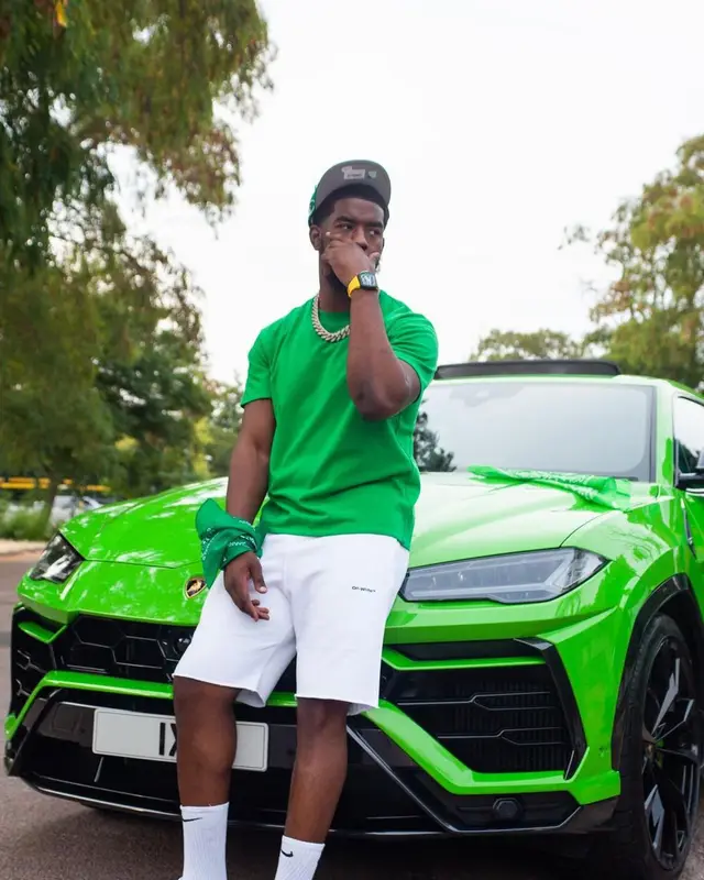 Tion Wayne outfit in Bottega Veneta, Off-White, and Nike, 2022