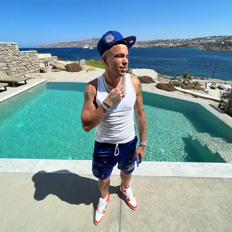 Sfera Ebbasta outfit in Gallery Dept., New Era, and Nike, 2022