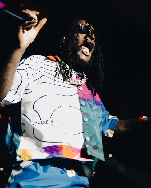 Burna Boy outfit in Cease±Desist, 2022