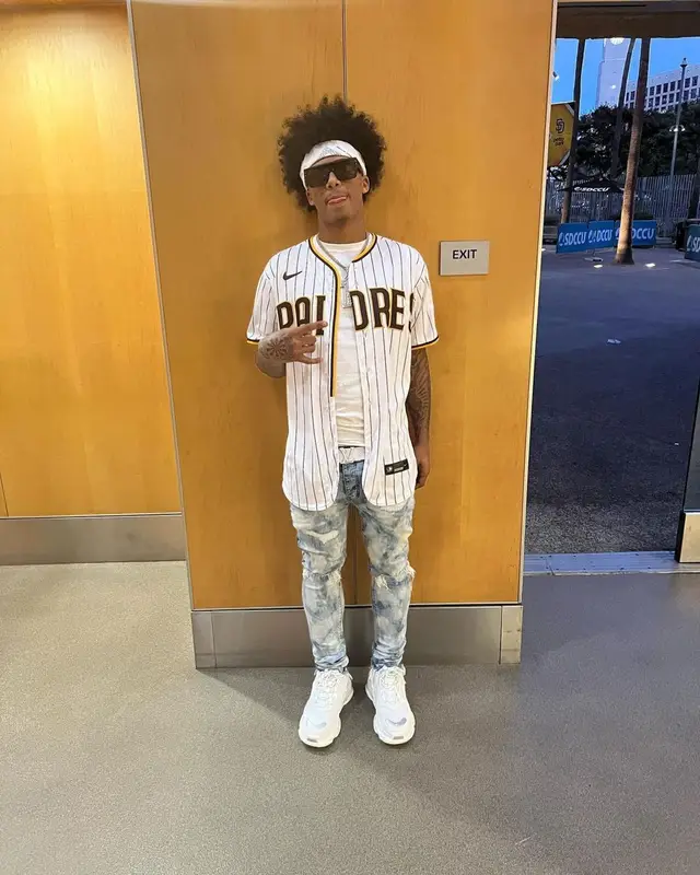 Mikey outfit in Nike, Purple Brand, and Louis Vuitton, 2022