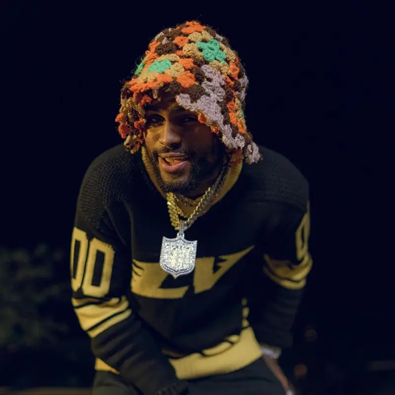 Dave East outfit in Louis Vuitton, Nike, and Gallery Dept., 2022