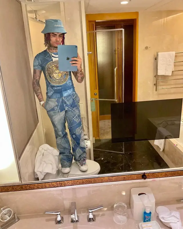 Lil Pump outfit in Versace, Chanel, and Fendi, 2022
