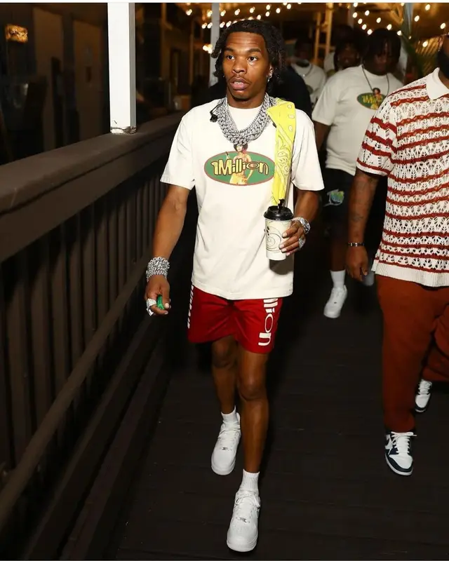 Lil Baby outfit in One Million Clothing and Nike, 2022