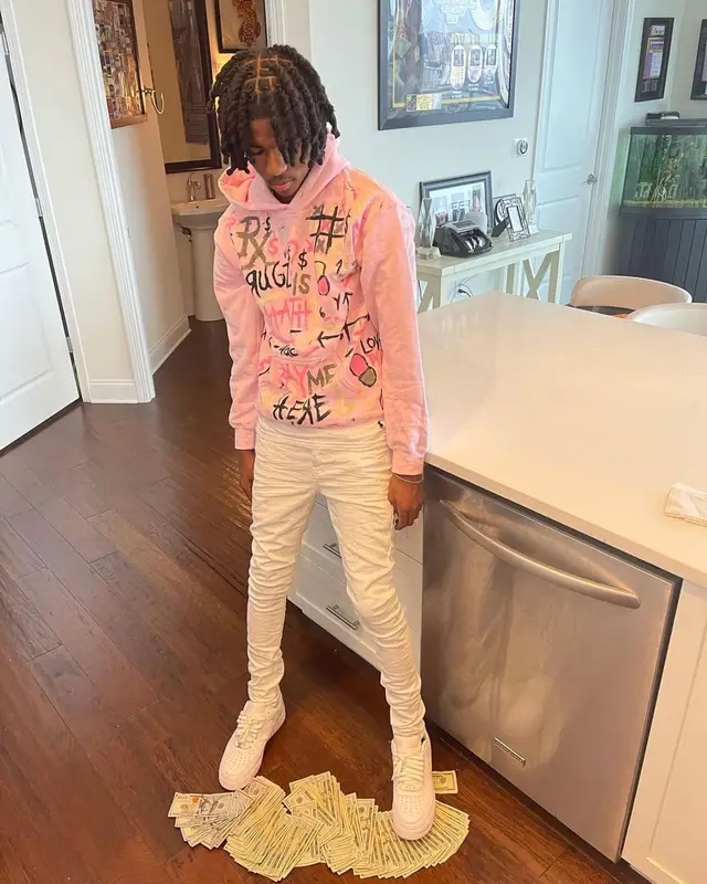 Lil Darius outfit in Osimiri, Purple Brand, and Nike, 2022