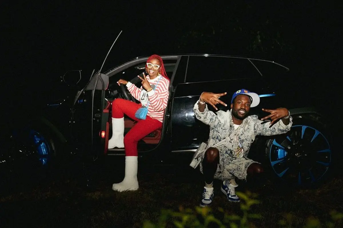 Meek Mill outfit in Louis Vuitton and Nike, 2022