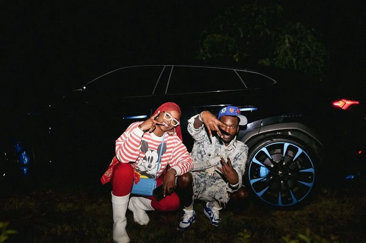 Meek Mill outfit in Louis Vuitton and Nike, 2022