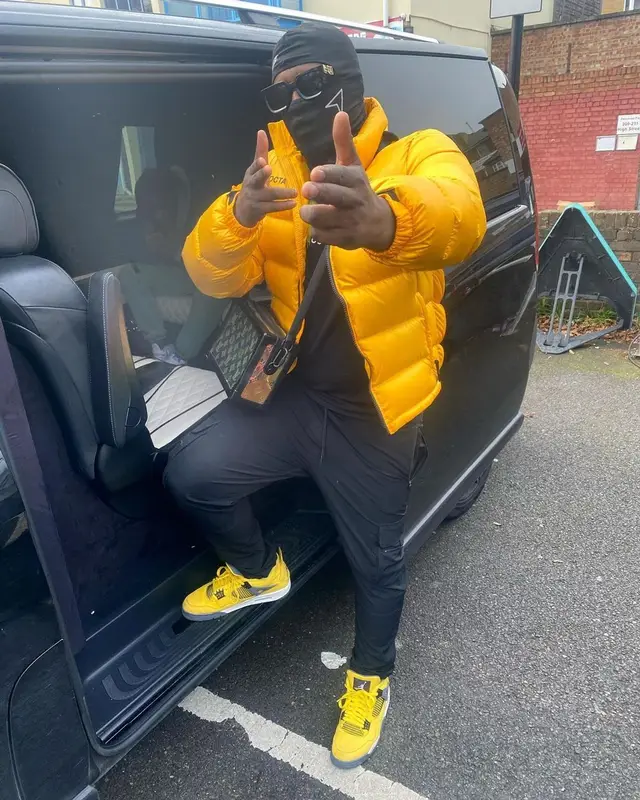 Swarmz outfit in Nike, Louis Vuitton, and Drake Merch, 2022