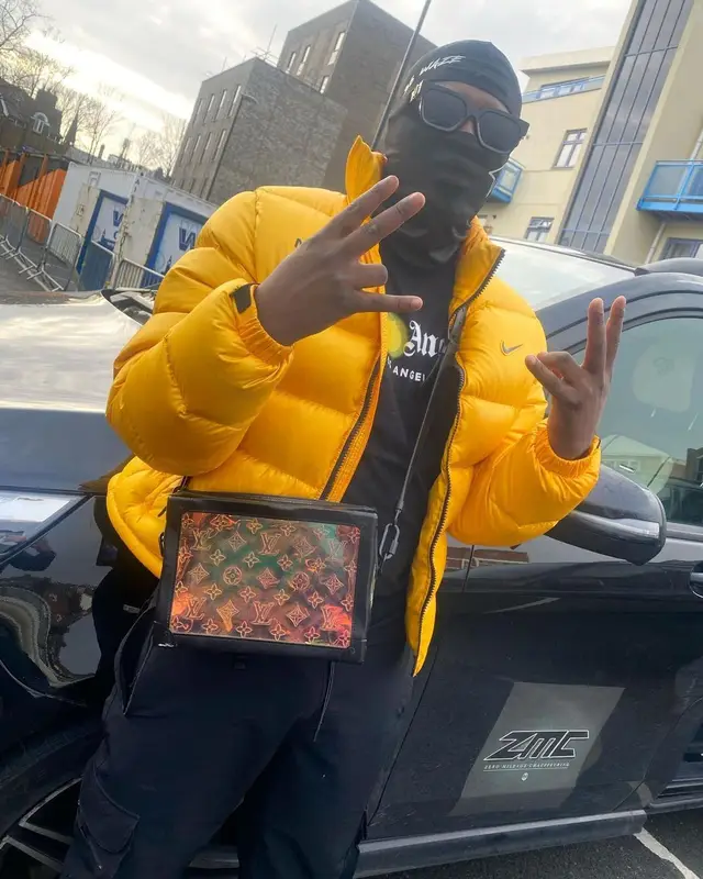 Swarmz outfit in Nike, Louis Vuitton, and Drake Merch, 2022