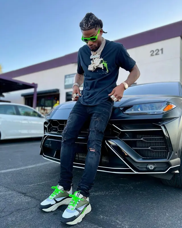 CJ So Cool outfit in Cactus Jack, Versace, and Dior, 2022