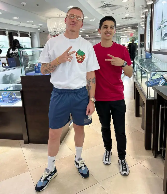 Macklemore outfit in Eric Emanuel, New Balance, and Nike, 2022