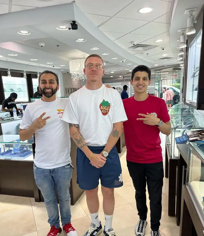 Macklemore outfit in Eric Emanuel, New Balance, and Nike, 2022