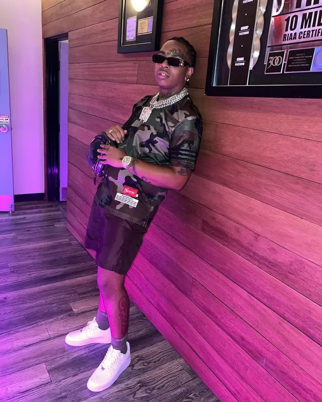 Lil Gotit outfit in Supreme, Burberry, and Balenciaga, 2022