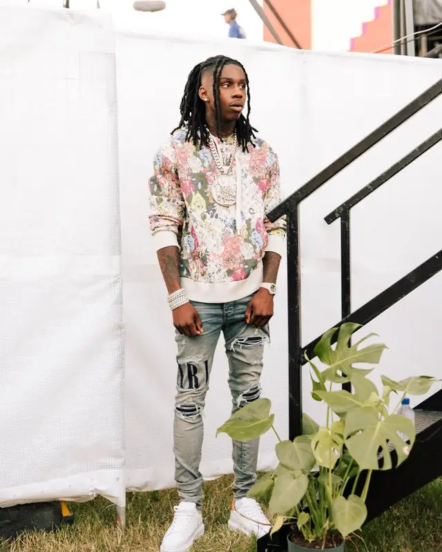 Polo G outfit in Louis Vuitton and Amiri, 2022