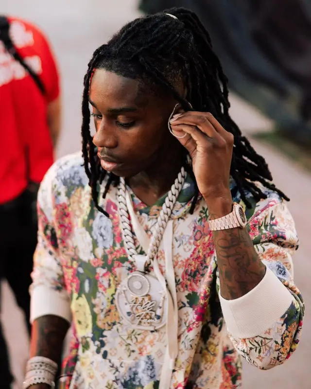 Polo G outfit in Louis Vuitton and Amiri, 2022