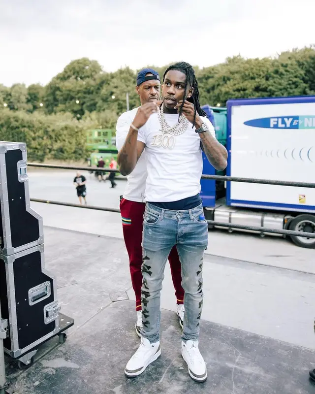 Polo G outfit in Celine, Amiri, and Jordan, 2022