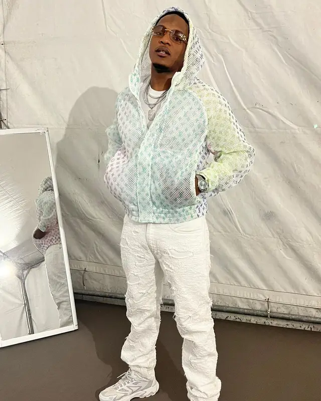 Niska outfit in Louis Vuitton, Givenchy, and Cartier, 2022