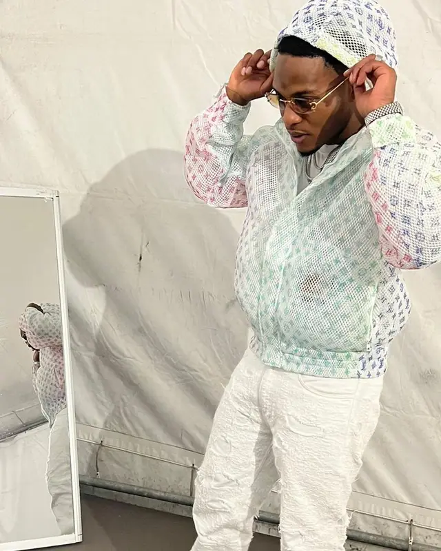 Niska outfit in Louis Vuitton, Givenchy, and Cartier, 2022