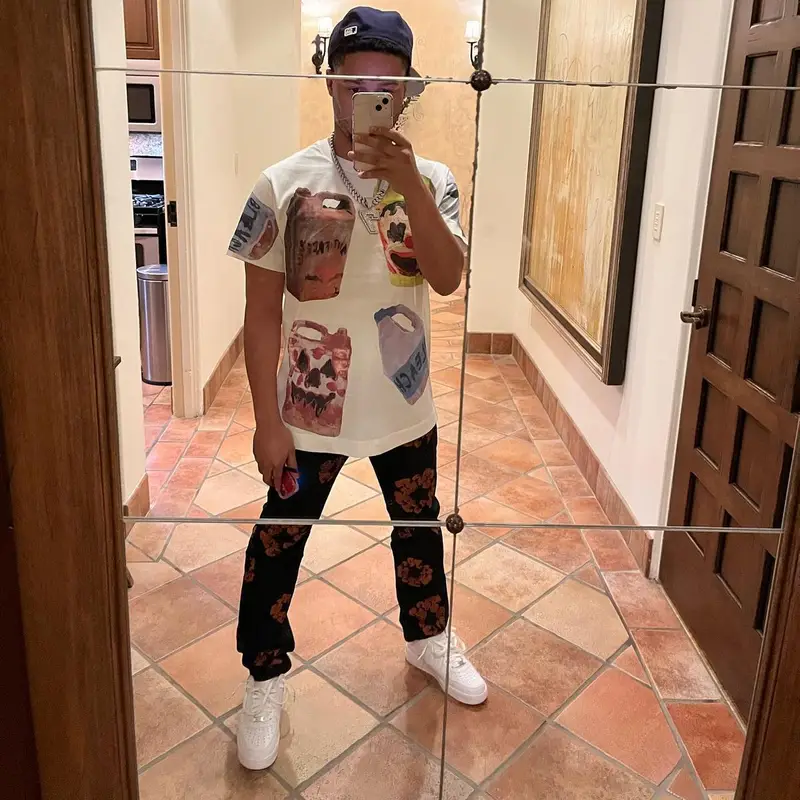Veeze outfit in Givenchy, Levi’s, and Denim Tears, 2022