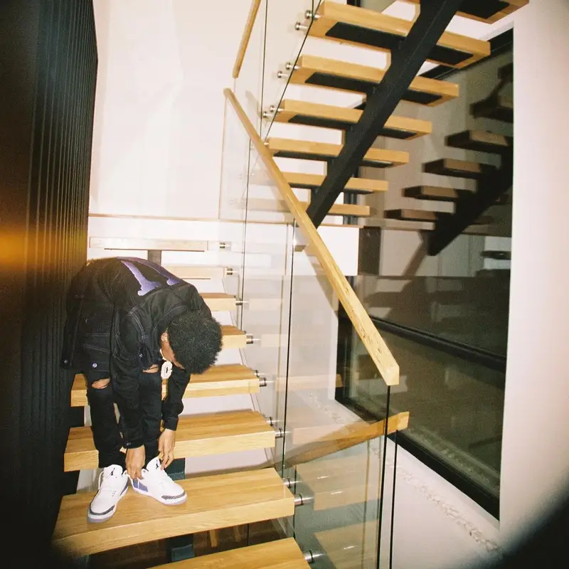 Lil Poppa outfit in Vlone, Amiri, and Jordan, 2022