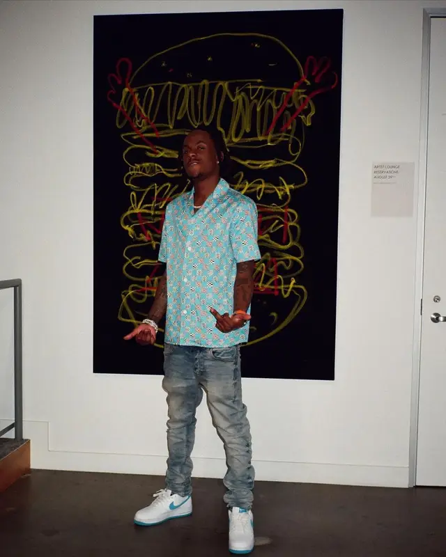 Rich The Kid outfit in Louis Vuitton, Amiri, and Nike, 2022
