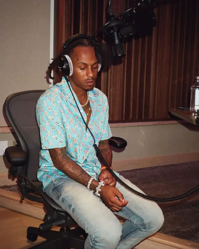 Rich The Kid outfit in Louis Vuitton, Amiri, and Nike, 2022