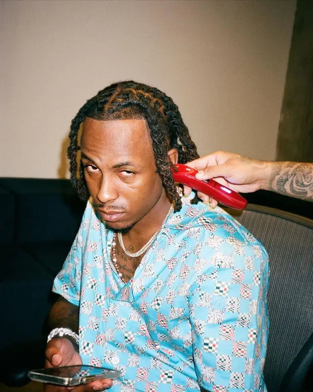 Rich The Kid outfit in Louis Vuitton, Amiri, and Nike, 2022