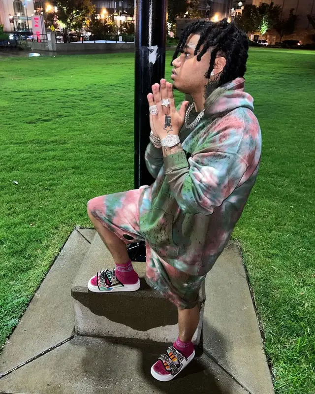 No Cap outfit in Dsquared2, Louis Vuitton, and Christian Louboutin, 2022