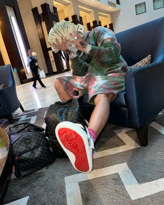 No Cap outfit in Dsquared2, Louis Vuitton, and Christian Louboutin, 2022