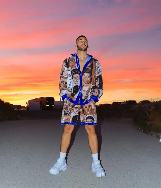 Manuel Turizo outfit in KidSuper, Maison Margiela, and Reebok, 2022