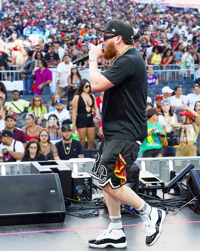 Miky Woodz outfit in Rhude, Balenciaga, and New Era, 2022
