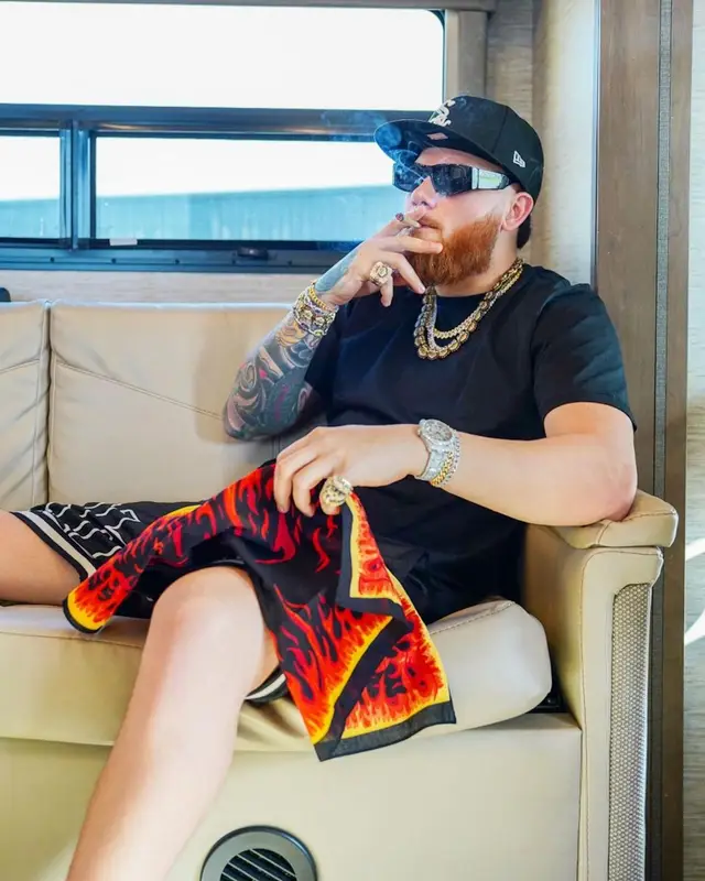 Miky Woodz outfit in Rhude, Balenciaga, and New Era, 2022