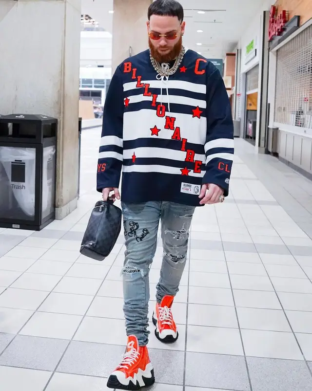 Miky Woodz outfit in Billionaire Boys Club, Amiri, and Louis Vuitton, 2022