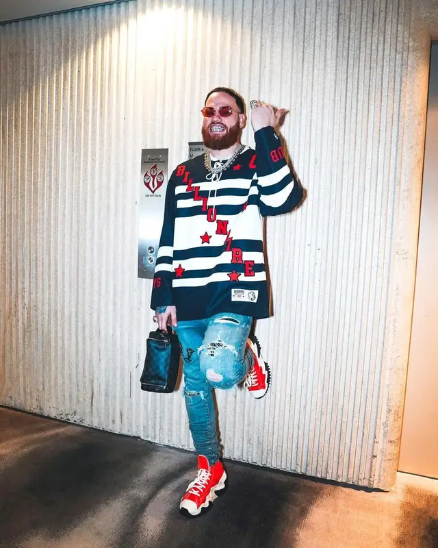 Miky Woodz outfit in Billionaire Boys Club, Amiri, and Louis Vuitton, 2022