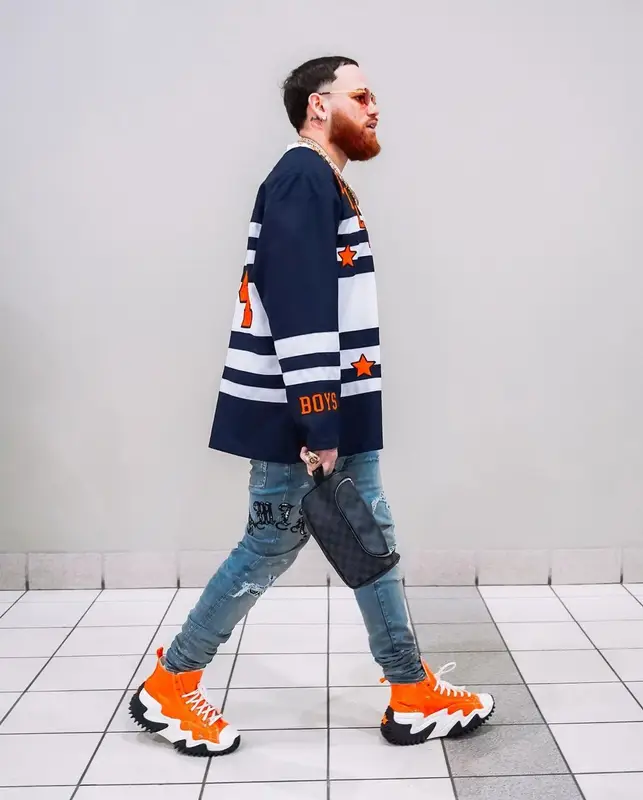 Miky Woodz outfit in Billionaire Boys Club, Amiri, and Louis Vuitton, 2022