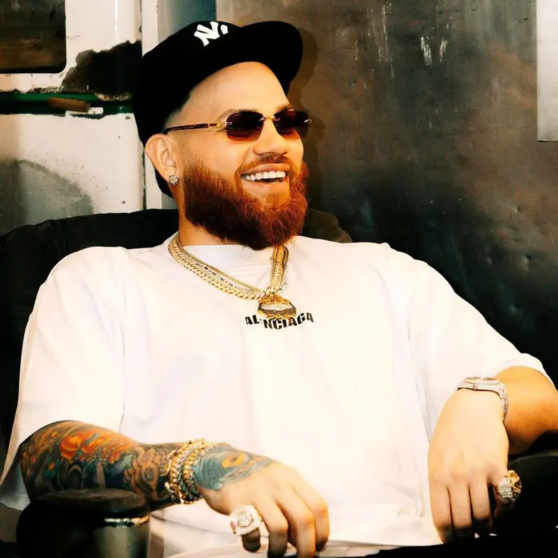 Miky Woodz outfit in Balenciaga and New Era, 2022