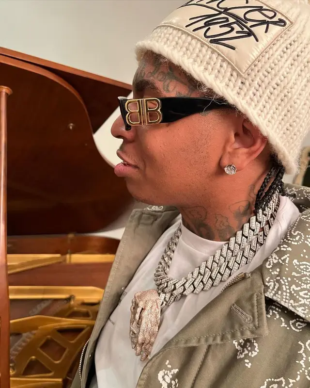 Lil Gotit outfit in Amiri, Balenciaga, and Saint Michael, 2022