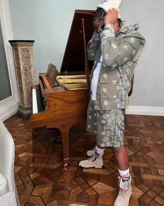 Lil Gotit outfit in Amiri, Balenciaga, and Saint Michael, 2022