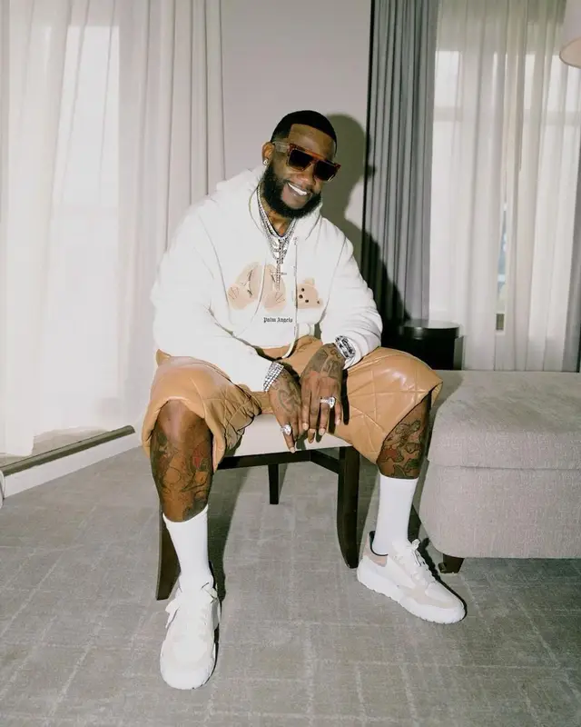 Gucci Mane outfit in Palm Angels, Dries Van Noten, and Celine, 2022