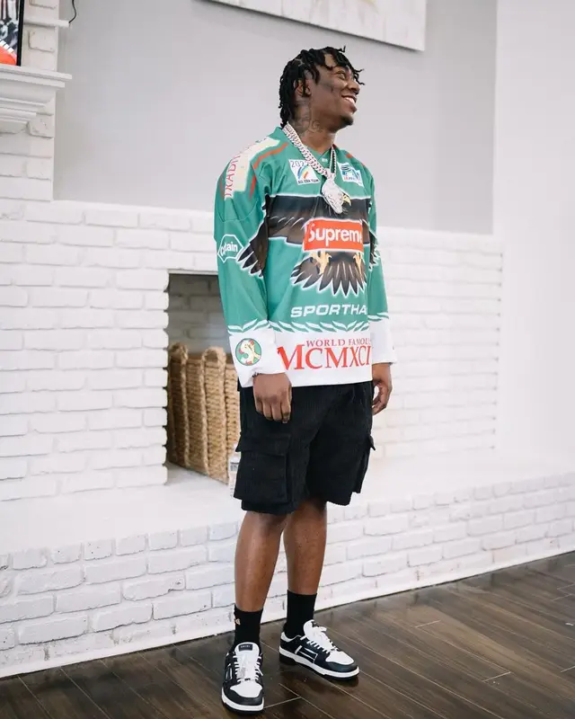 Fredo Bang outfit in Supreme, Amiri, and Palm Angels, 2022