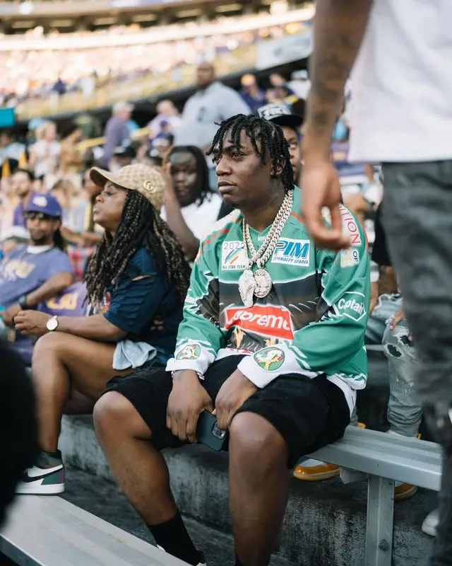 Fredo Bang outfit in Supreme, Amiri, and Palm Angels, 2022
