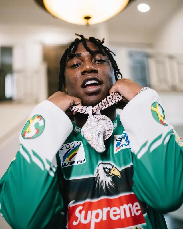 Fredo Bang outfit in Supreme, Amiri, and Palm Angels, 2022