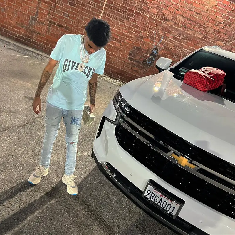Lil Poppa outfit in Givenchy, Amiri, and Dior, 2022