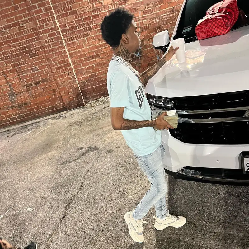 Lil Poppa outfit in Givenchy, Amiri, and Dior, 2022